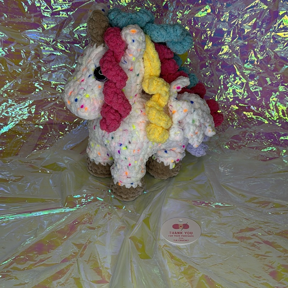 Multicolor crochet unicorn plush